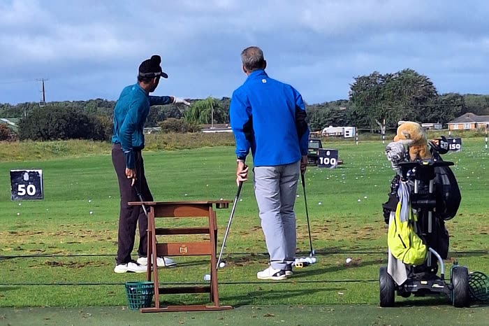 Range work with his coach